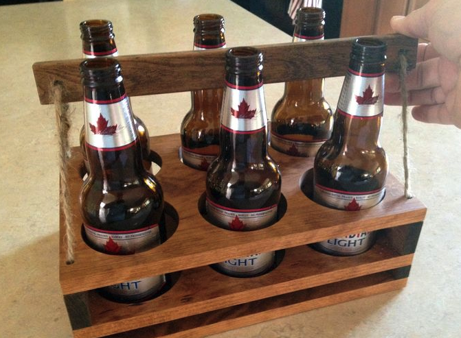 A bottle holder that is made from wood